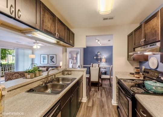 Fitted Kitchen With Island Dining at Brittany Commons Apartments, Spotsylvania, 22553